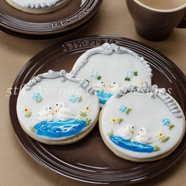 learn the art of royal icing pressure piped swans
